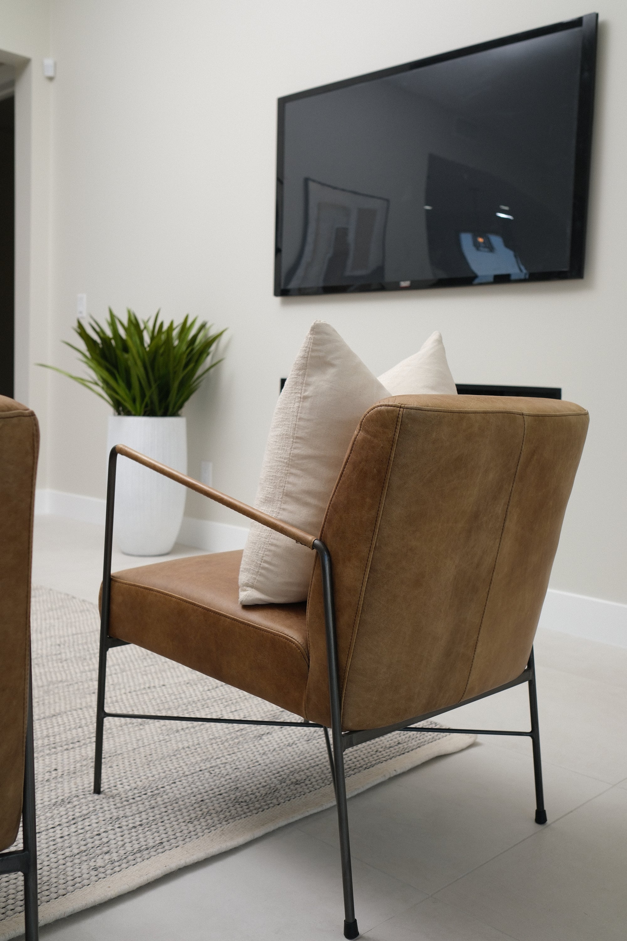 BROWN LEATHER CHAIR 1