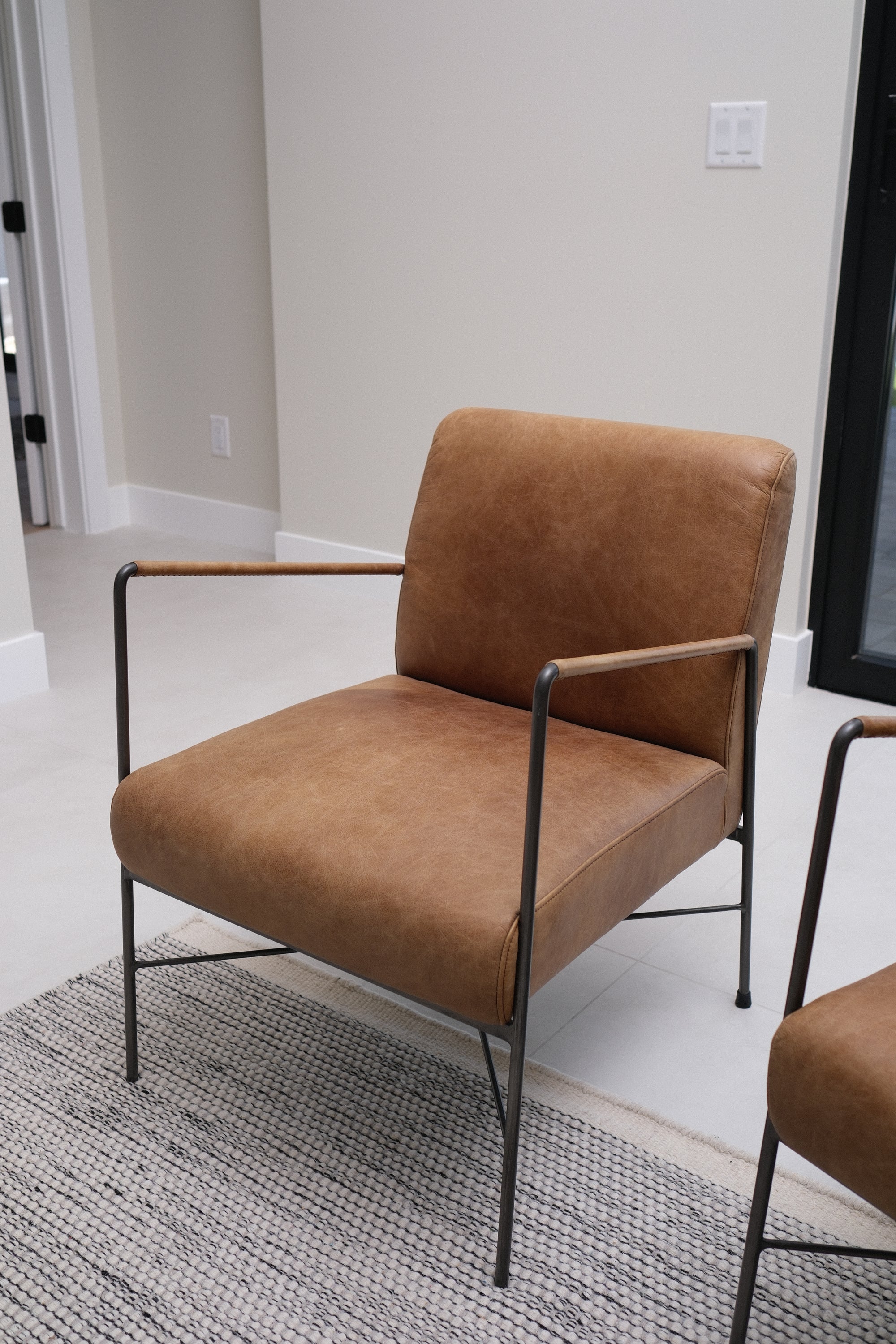 BROWN LEATHER CHAIR 1