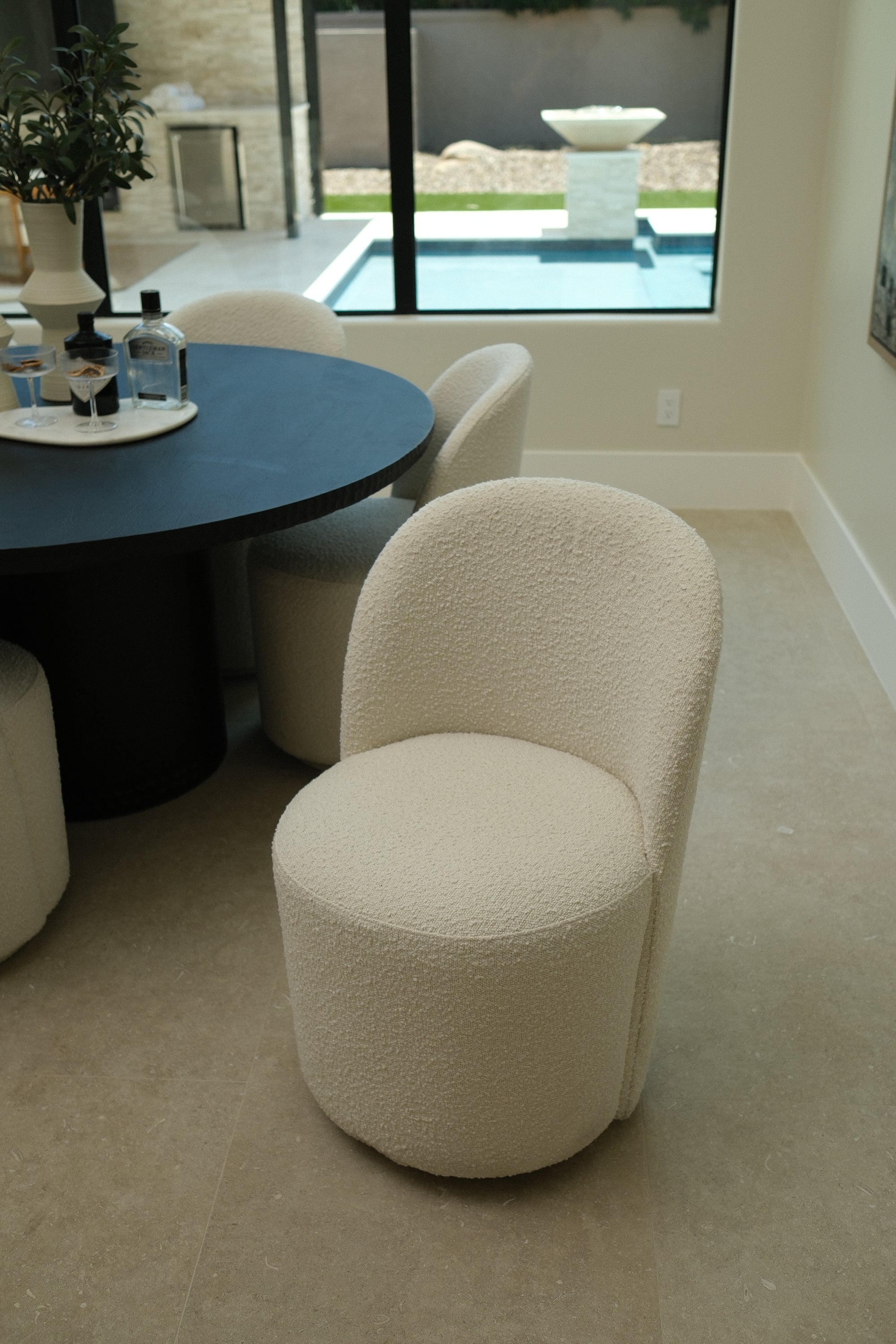 IVORY SWIVEL DINING CHAIR 1