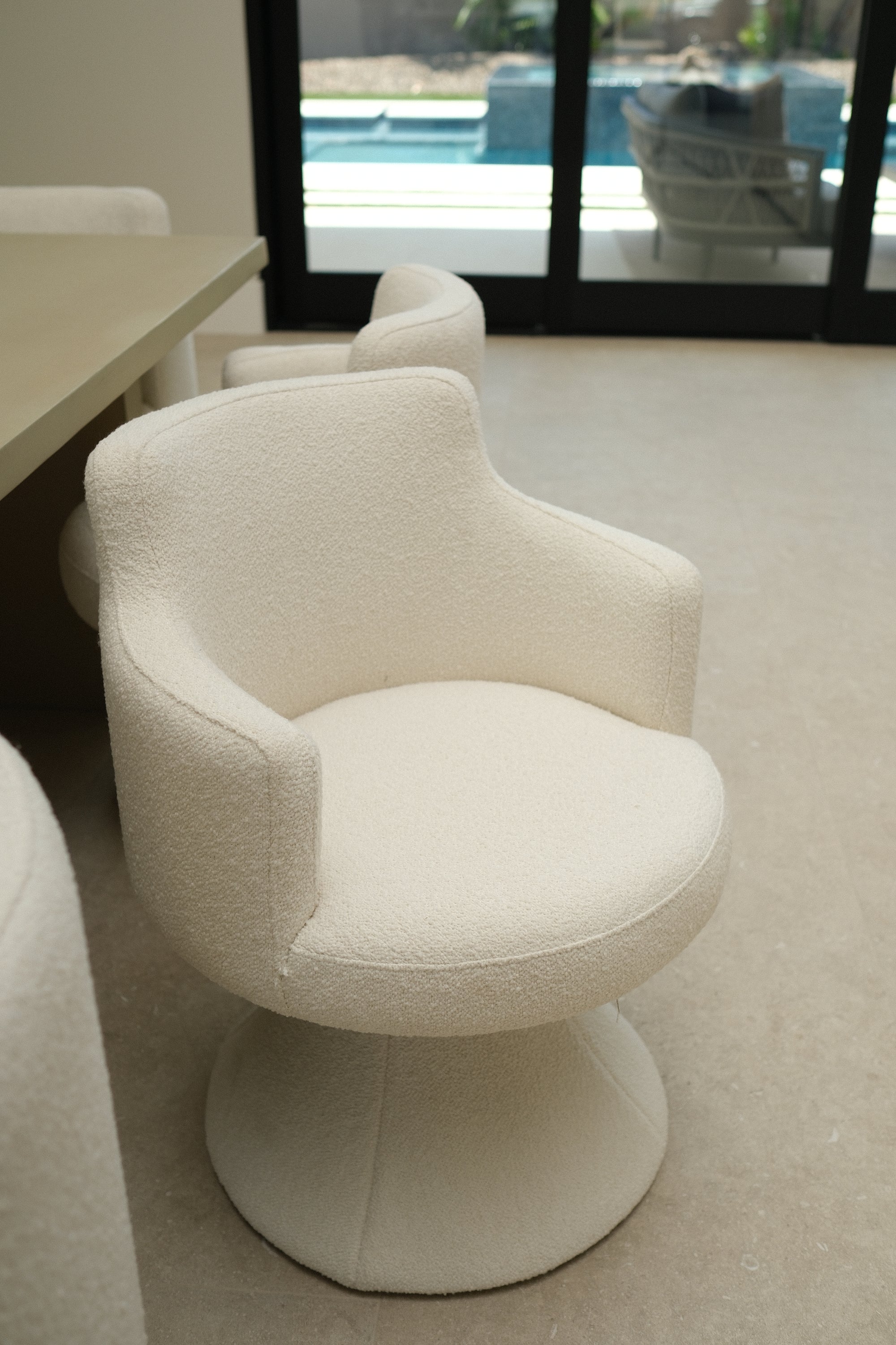 BOUCLE WHITE SWIVEL DINING CHAIR 3