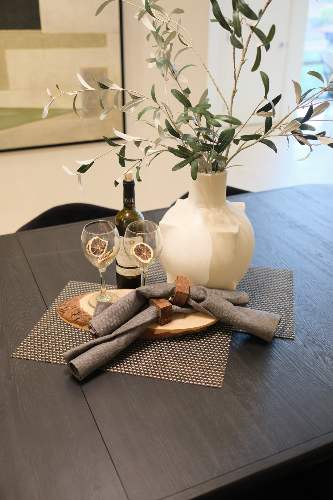 77.75-95.75IN BLACK DINING TABLE